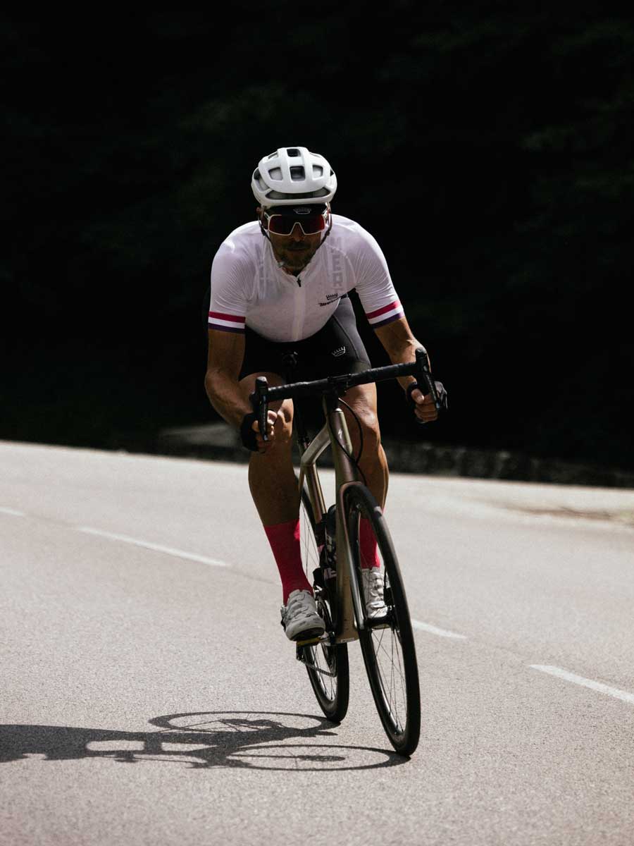Cyclist in a Provence jersey on a road in Provence